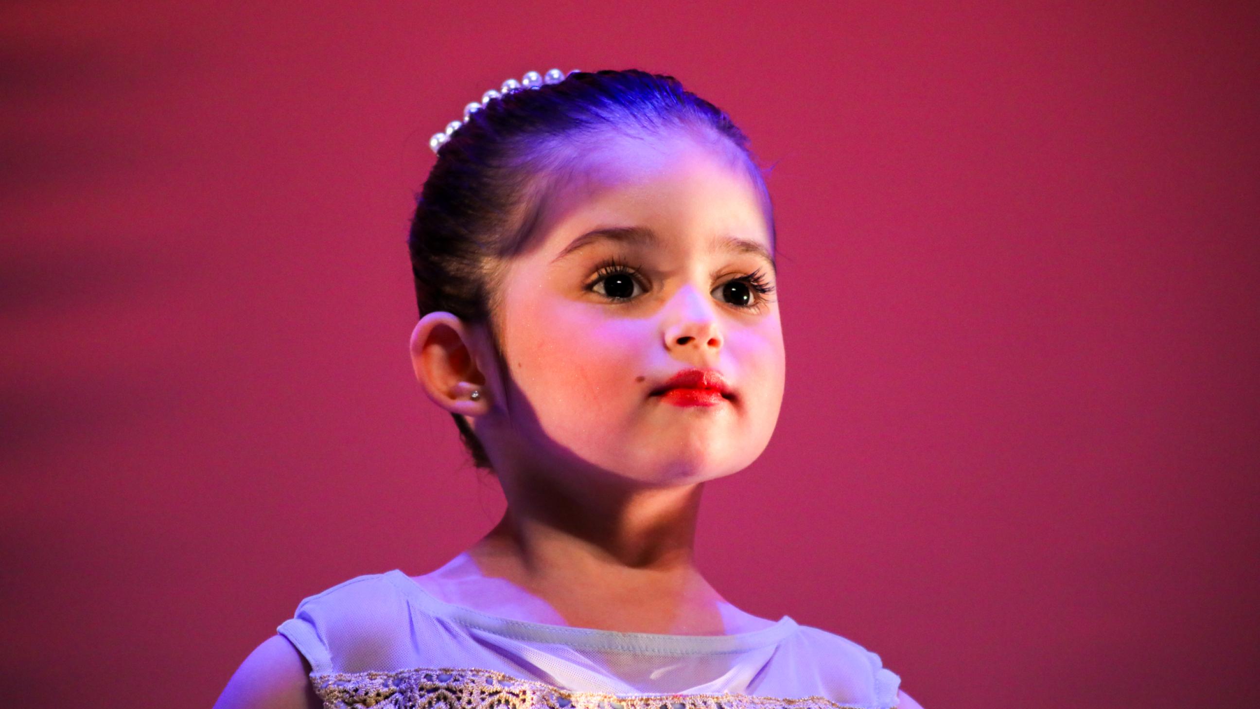 2025 Dance Production Dancer with pink background