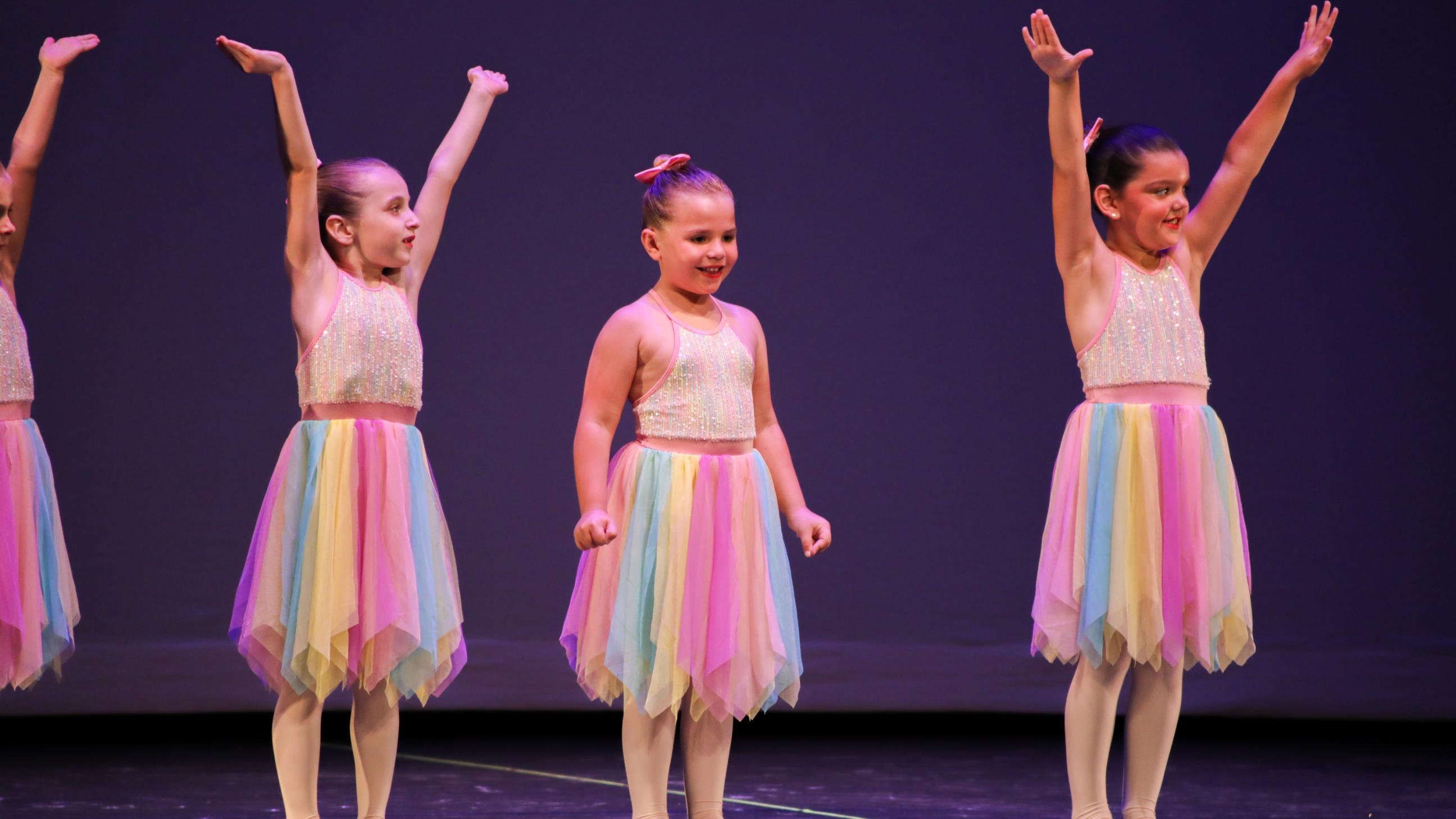 Young Ballet Dancers with colorful skirts