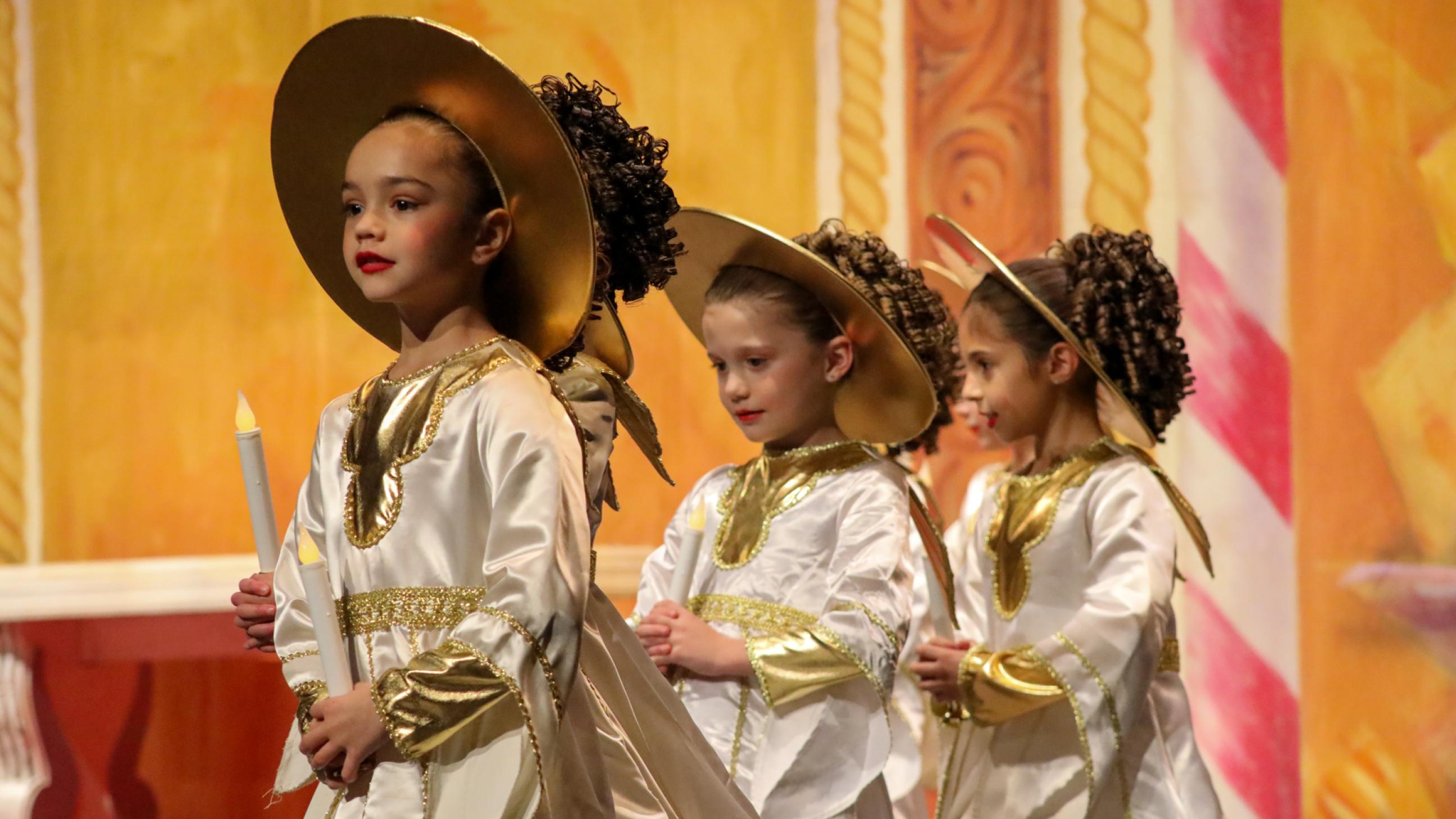 Angels holding candles