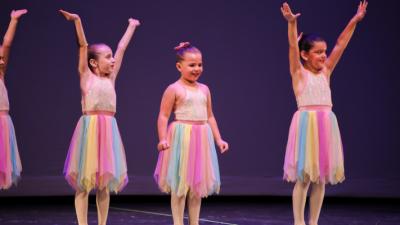 Young Ballet Dancers with colorful skirts