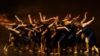 Dancers in a group black costumes