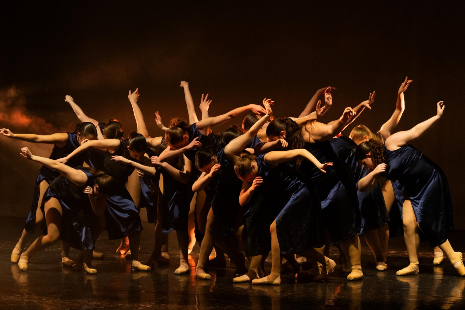 Dancers in a group black costumes