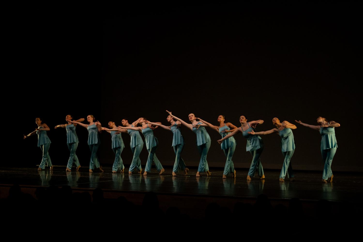 Contemporary Dancers in Teal costumes